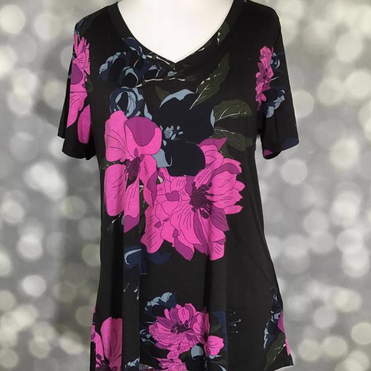 Elegant LuLaRoe Christy T in black with pink floral print. A chic V-neck top with a relaxed fit and bold, feminine design.