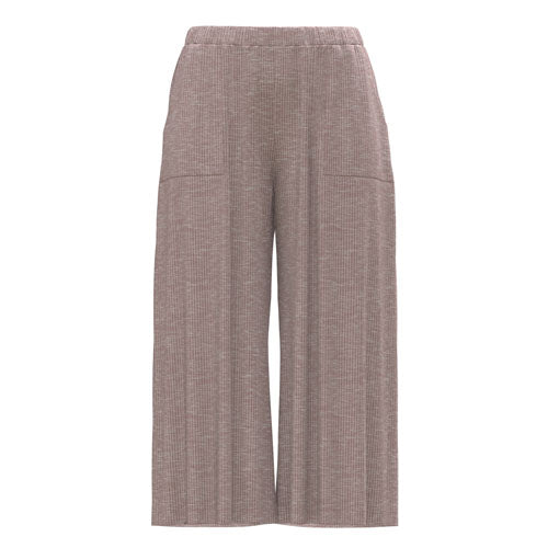 Peach colored pants on white background
