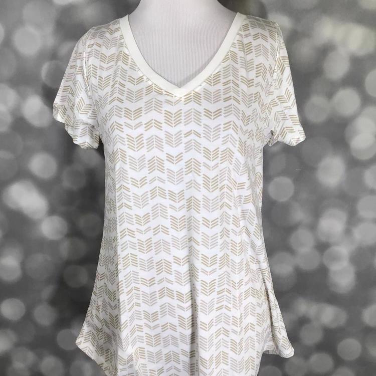 LuLaRoe Christy T in white with gold chevron arrow print