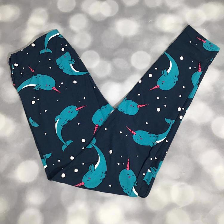LuLaRoe leggings in navy blue with playful teal narwhal print and pink horns, soft buttery fabric