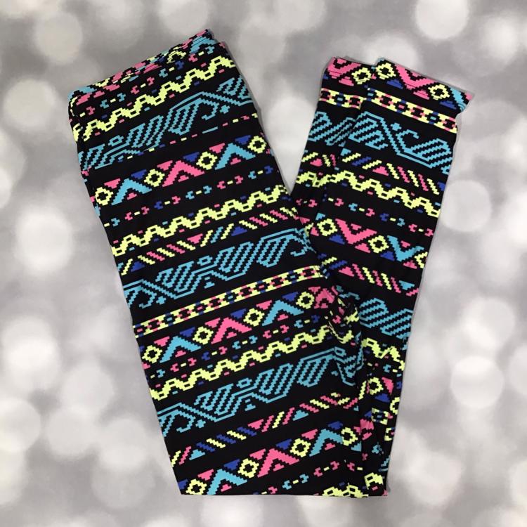 LuLaRoe leggings in black with neon tribal geometric print in pink, blue, and yellow, buttery soft fabric, perfect for bold everyday style.