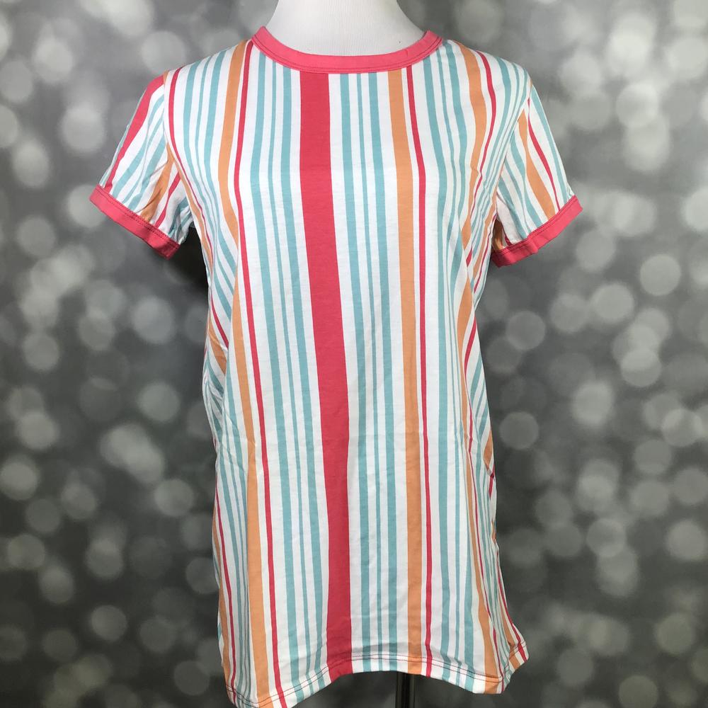 LuLaRoe Liv T in multicolor vertical stripes of coral, aqua, orange, and white with coral trim” | “Front view of LuLaRoe Liv T on mannequin featuring bright coral, aqua, orange, and white vertical stripe pattern with solid coral collar and sleeve trim against a blurred background