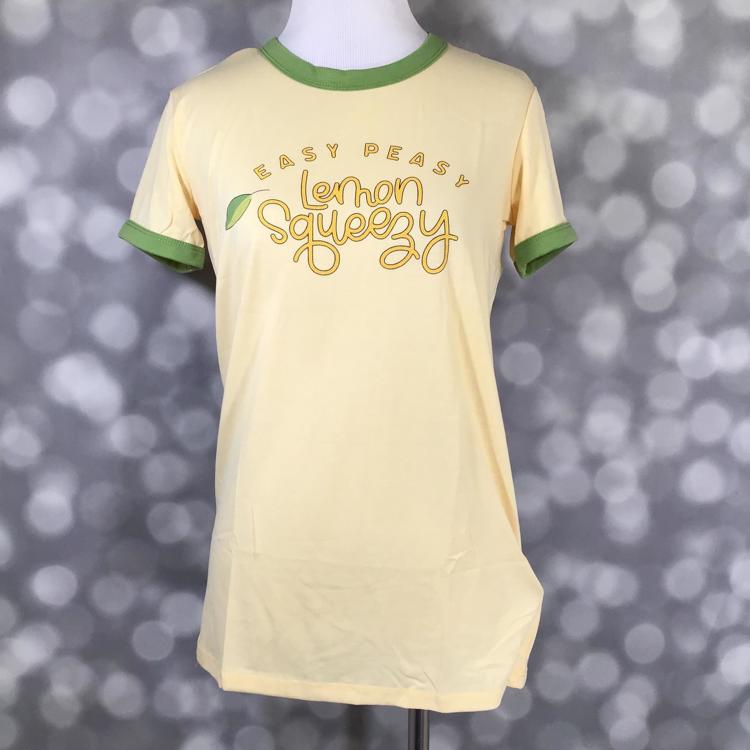 LuLaRoe Liv Tee in light yellow with “Easy Peasy Lemon Squeezy” graphic print