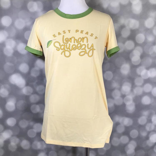 LuLaRoe Liv Tee in light yellow with “Easy Peasy Lemon Squeezy” graphic print