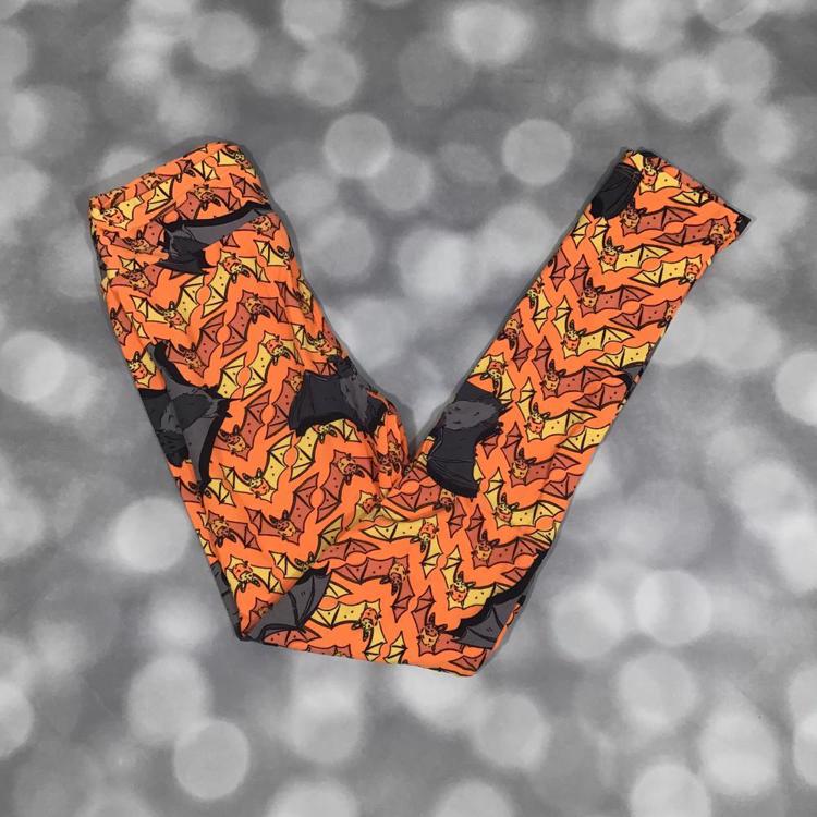 LuLaRoe Halloween leggings with orange background and black and yellow bat print