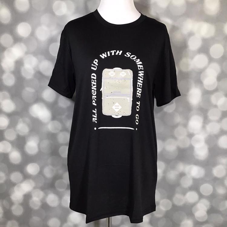 LuLaRoe Rocker T in black featuring “All Packed Up with Somewhere to Go” suitcase graphic from the Great Outdoors Collection.