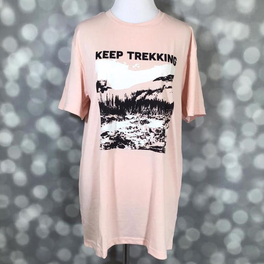 LuLaRoe Rocker T in blush pink featuring “Keep Trekking” mountain landscape graphic from the Great Outdoors Collection.