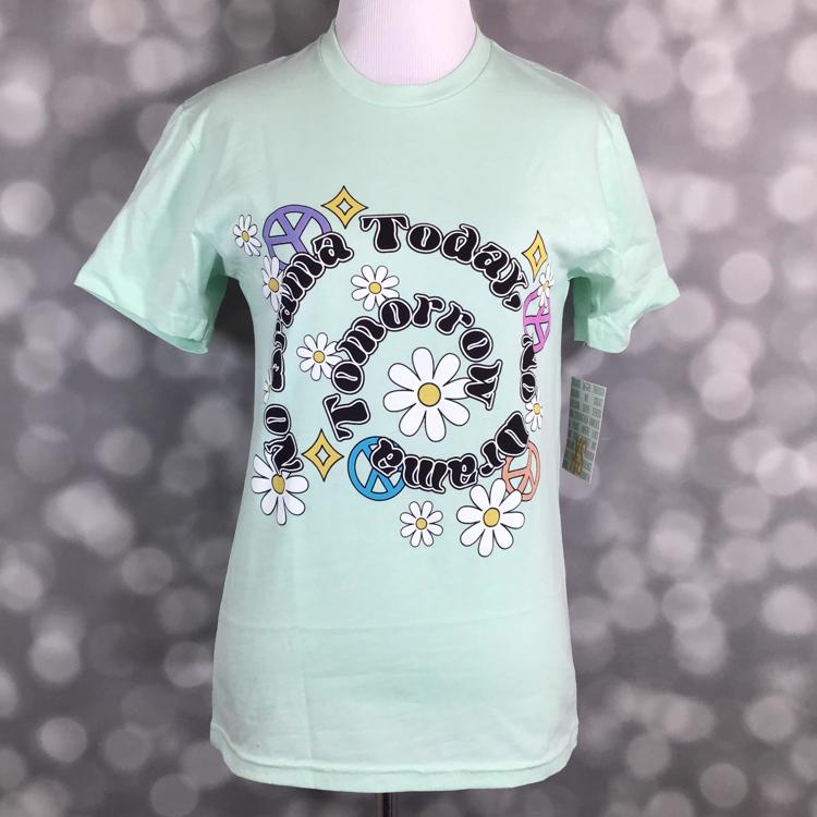 LuLaRoe Rocker T in mint green with “No Drama Today, Dream Tomorrow” daisy and peace sign graphic, retro-inspired tee.