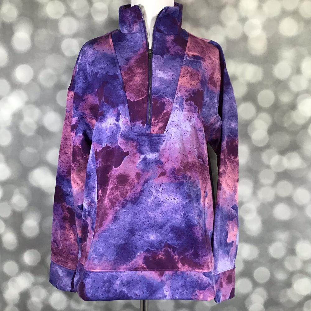 LuLaRoe Persistent Half Zip Pullover in purple and pink watercolor tie-dye print, boxy fit, funnel neck, soft sweatshirt fleece