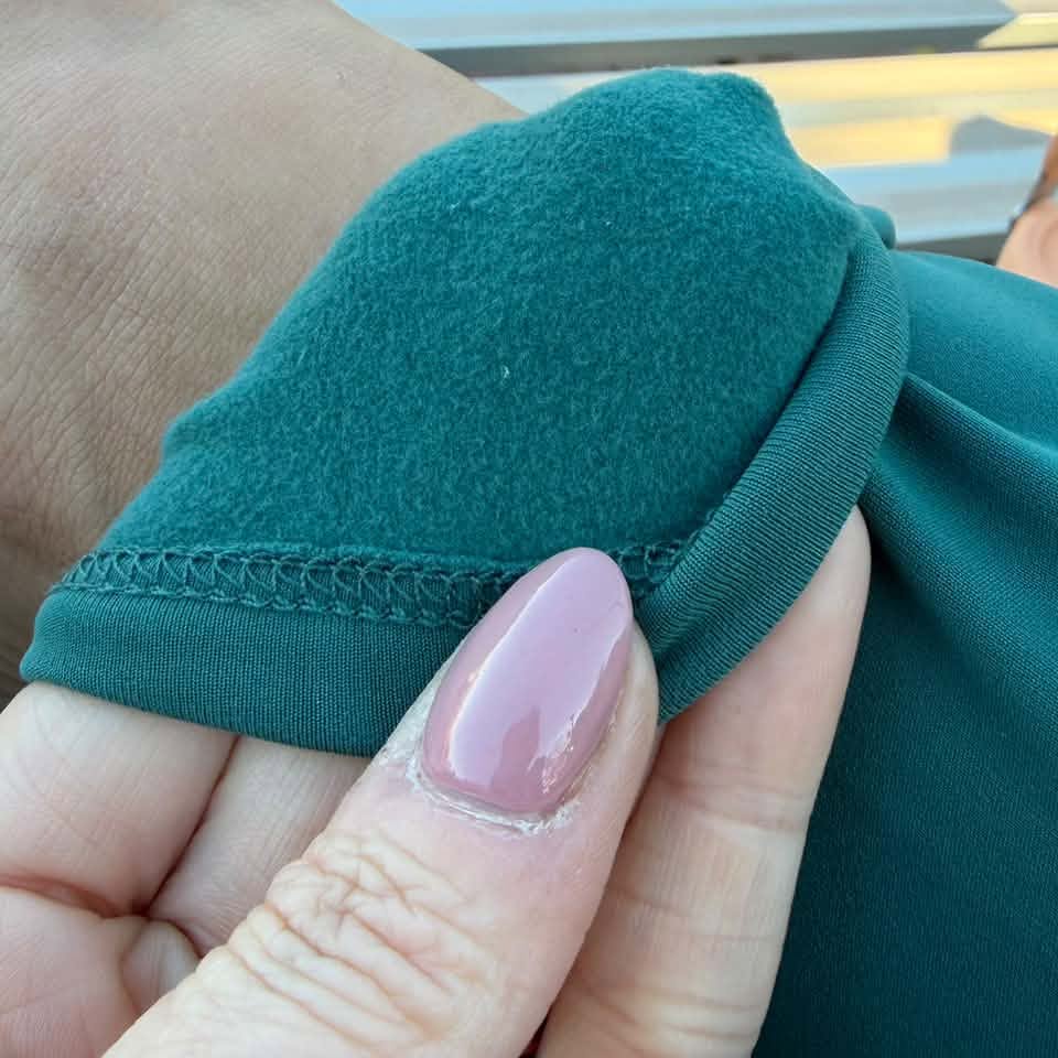 LuLaRoe WarmTech fleece-lined leggings solid deep teal blue - detail and lifestyle view 5