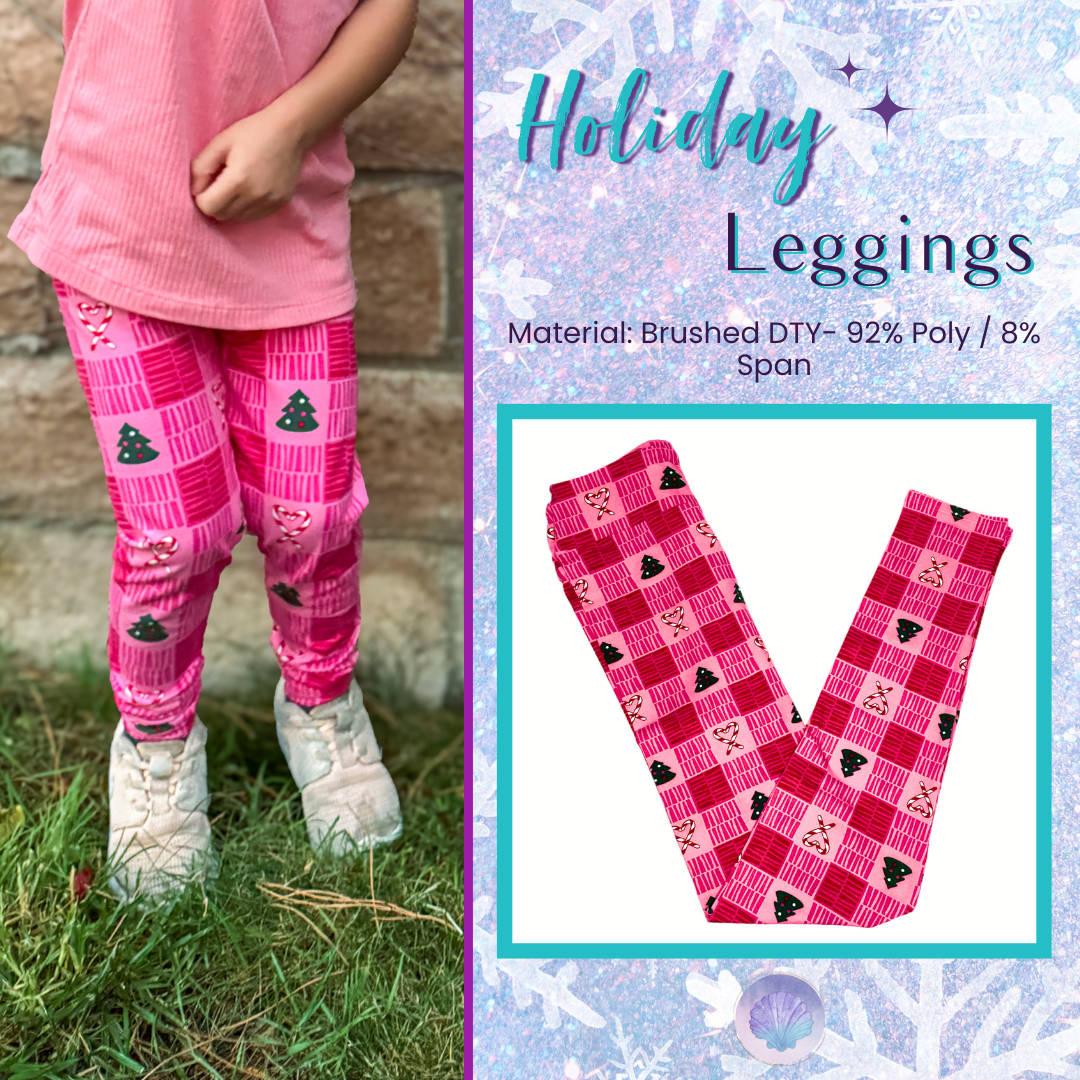 “Child wearing LuLaRoe holiday leggings in pink and red plaid pattern featuring green Christmas trees and candy canes, standing outside on grass.”
“Kids’ LuLaRoe leggings in bright pink and red plaid background with small green Christmas trees and candy cane motifs, holiday pattern.”