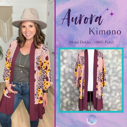 LuLaRoe Aurora bell sleeve kimono in a maroon, pink and yellow boho floral print