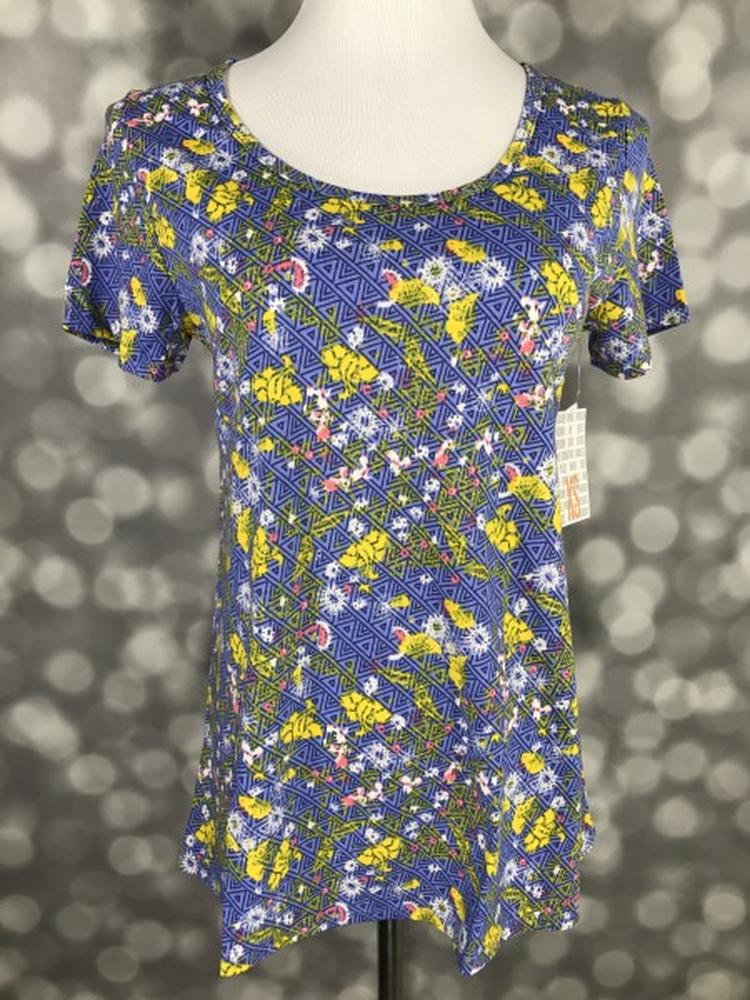 LuLaRoe Classic T periwinkle blue yellow wildflowers geometric triangles print on a short sleeve scoop neck relaxed A-line tee