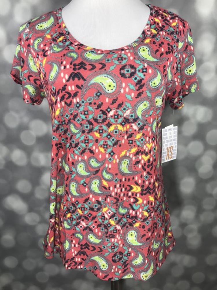 LuLaRoe Classic T dusty rose lime green teal ornate paisley print on a short sleeve scoop neck relaxed A-line tee