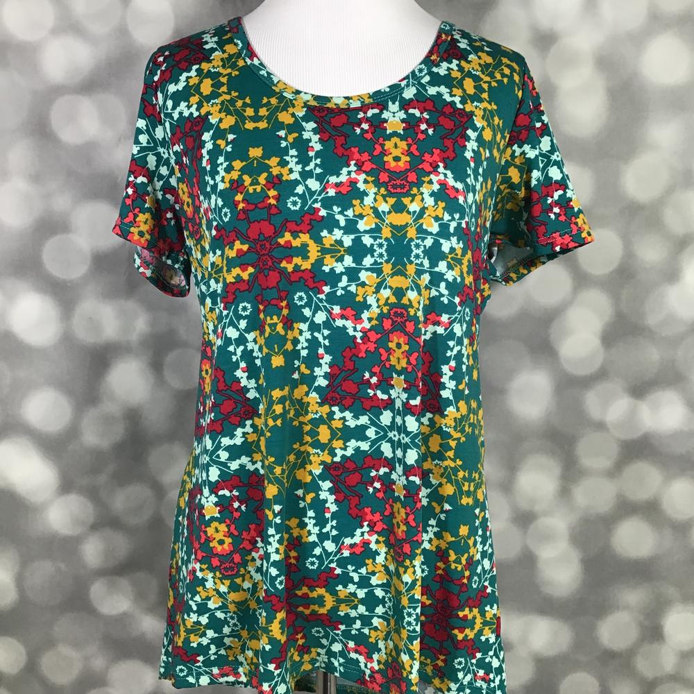 LuLaRoe Classic T deep teal burgundy mustard yellow ornamental floral print on a short sleeve scoop neck relaxed A-line tee