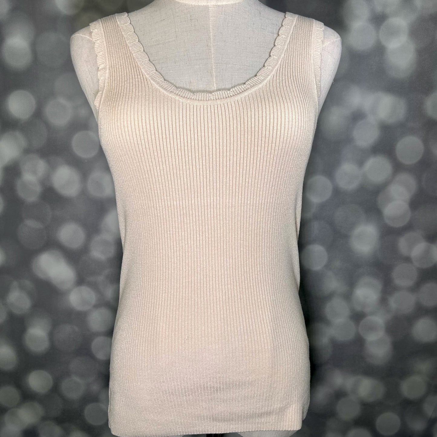 LuLaRoe Maydene Scallop Edge Tank in Solid Egret Ivory with rib knit fabric, fitted silhouette, and scalloped neckline and arm openings. Alternate product image.