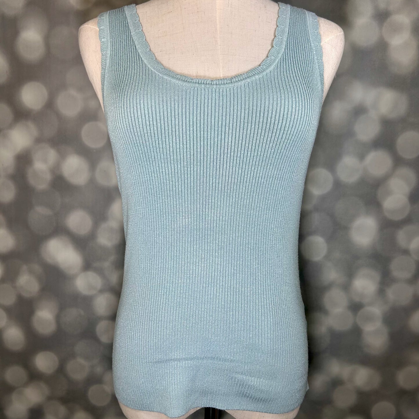 LuLaRoe Maydene Scallop Edge Tank in Solid Powder Blue with rib knit fabric, fitted silhouette, and scalloped neckline and arm openings. Alternate product image.