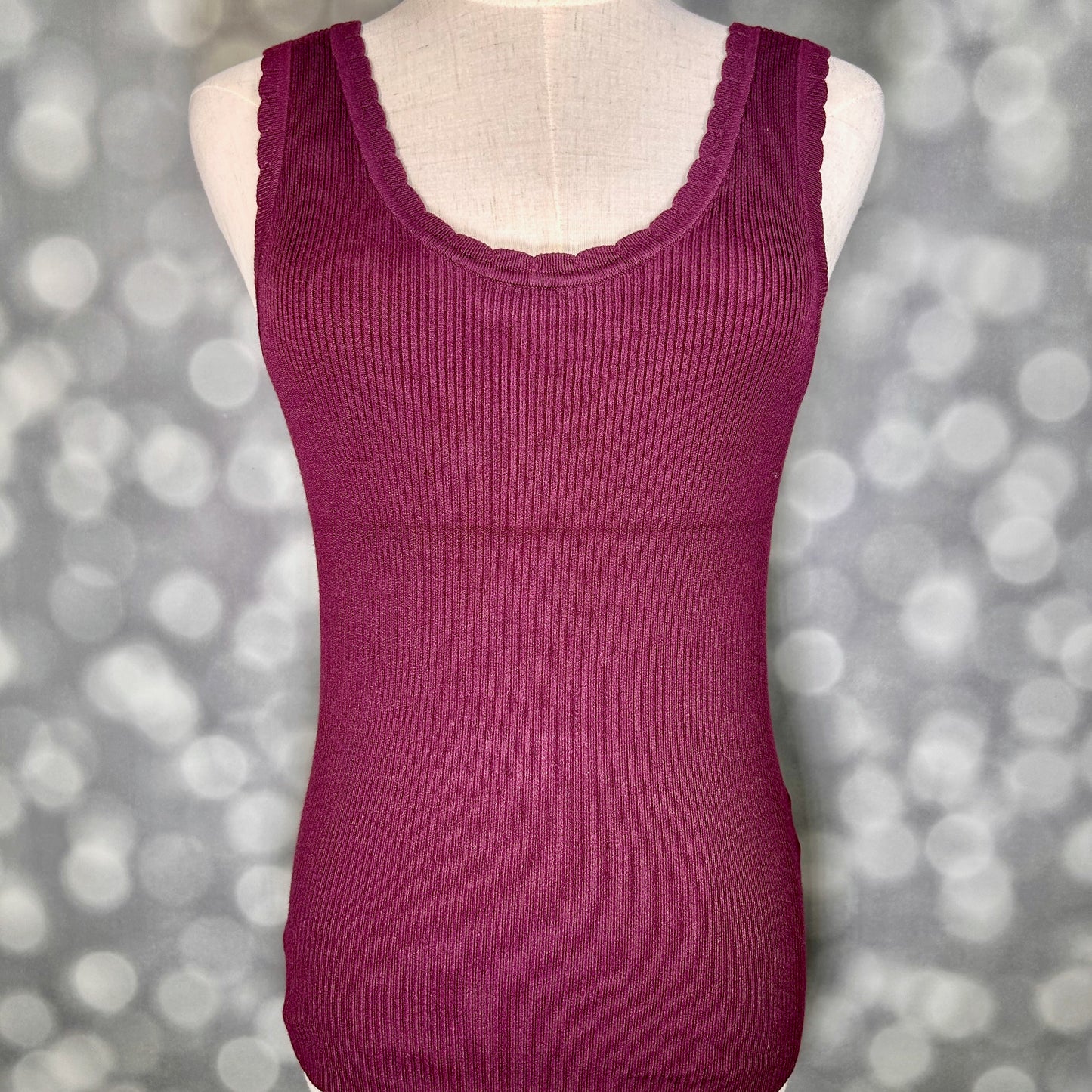 LuLaRoe Maydene Scallop Edge Tank in Solid Rich Plum with rib knit fabric, fitted silhouette, and scalloped neckline and arm openings. Alternate product image.