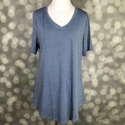 LuLaRoe Iris Tee in Coastal Harbor Stripe featuring fine navy blue and white horizontal stripes, a rounded v-neckline, relaxed short sleeves, tunic-length silhouette, and curved shirttail hem.