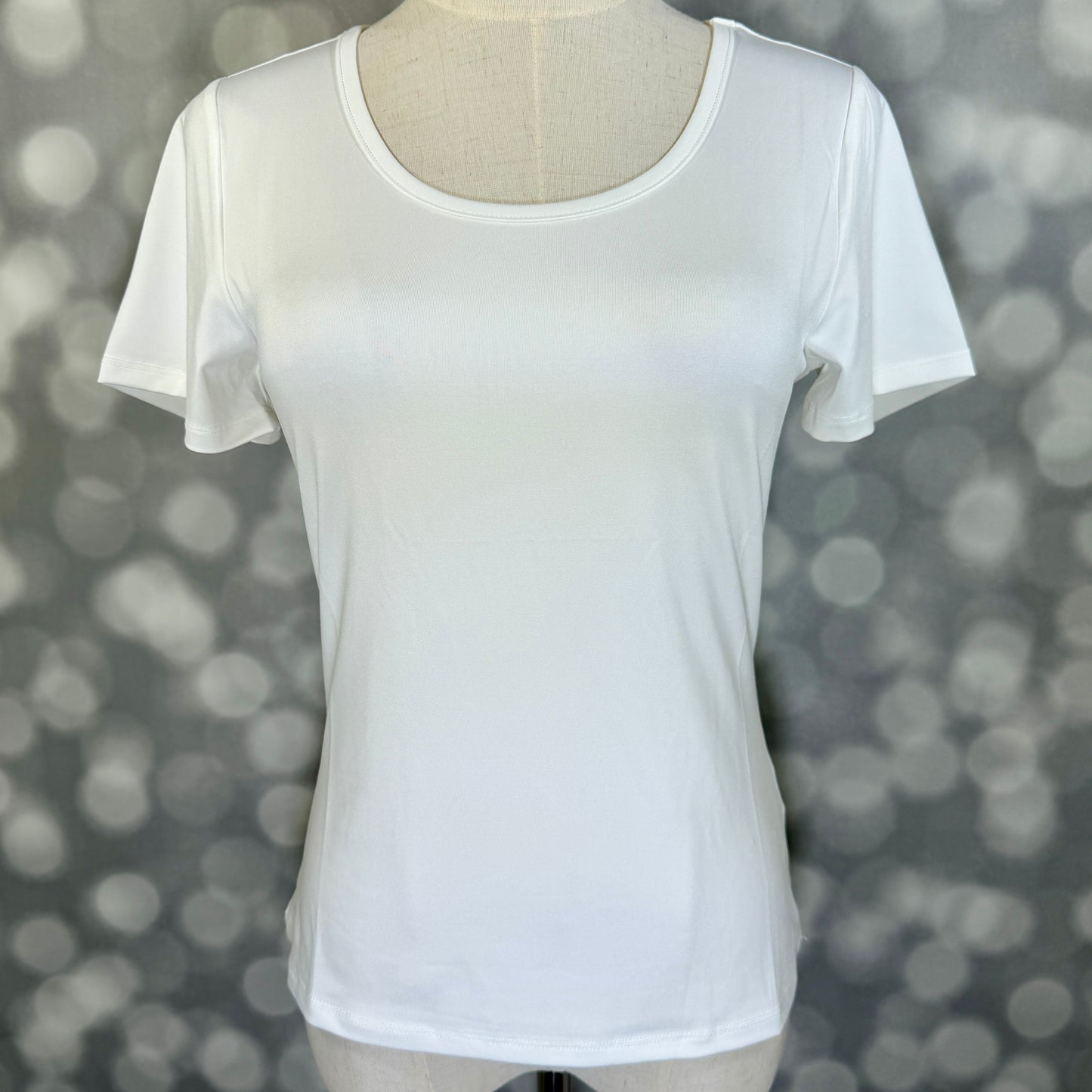 LuLaRoe Lani Scoop Neck Top in Solid White featuring short sleeves, a fitted silhouette, and a classic scoop neckline