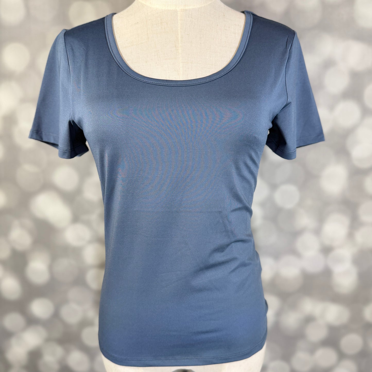 LuLaRoe Lani Scoop Neck Top in Solid Denim Blue featuring short sleeves, a fitted silhouette, and a classic scoop neckline