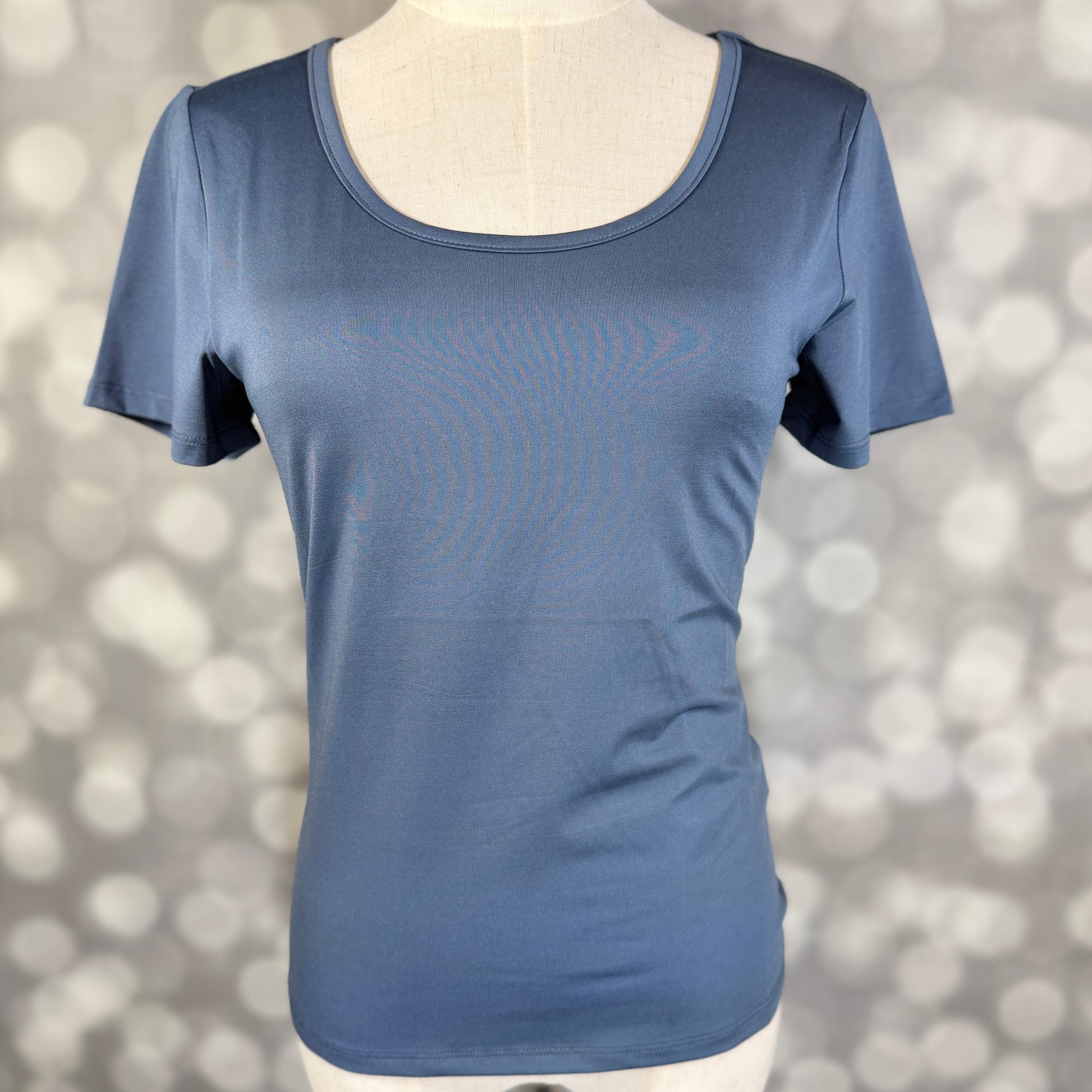 LuLaRoe Lani Scoop Neck Top in Solid Denim Blue featuring short sleeves, a fitted silhouette, and a classic scoop neckline
