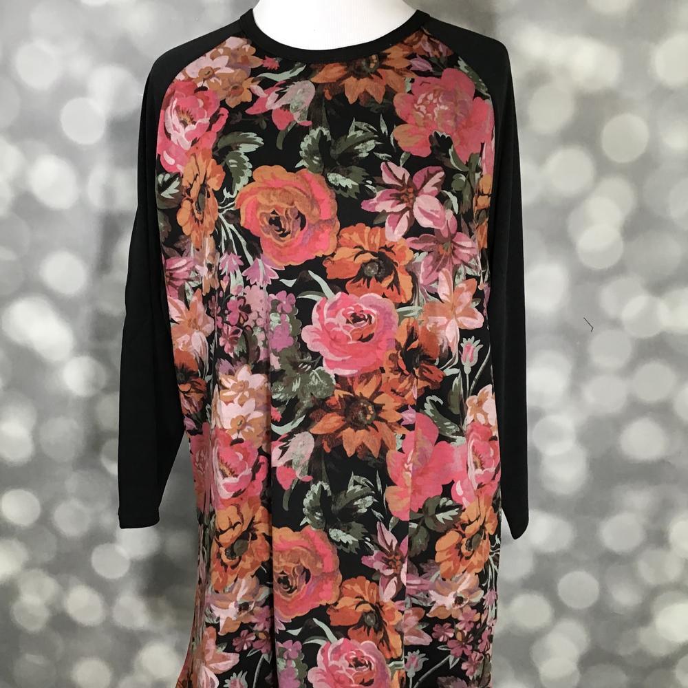 LuLaRoe Randy Tee in Vintage Sunset Garden featuring painterly coral, blush, terracotta, and olive floral blooms on a black background with black 3/4 raglan sleeves in size XL.