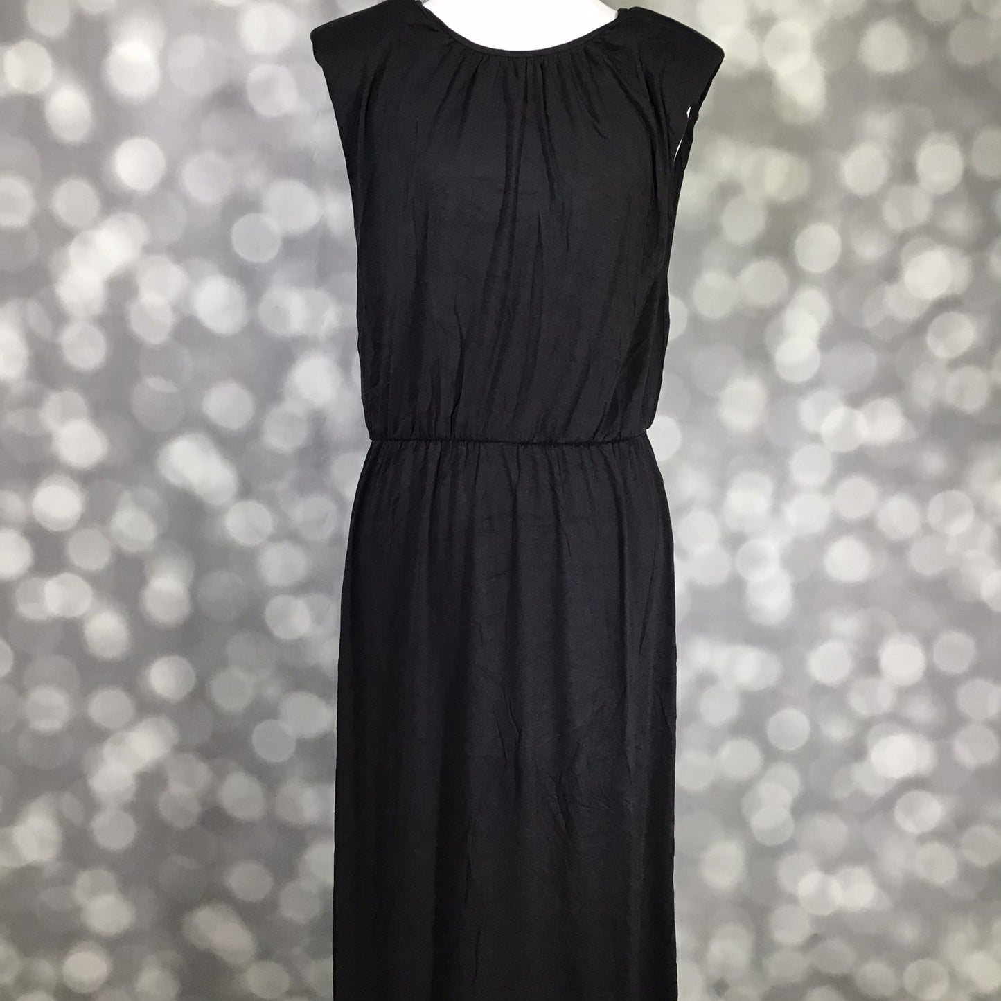 LuLaRoe Career Collection Serenity Dress in Solid Black with a modern muscle-tank silhouette and removable shoulder pads
