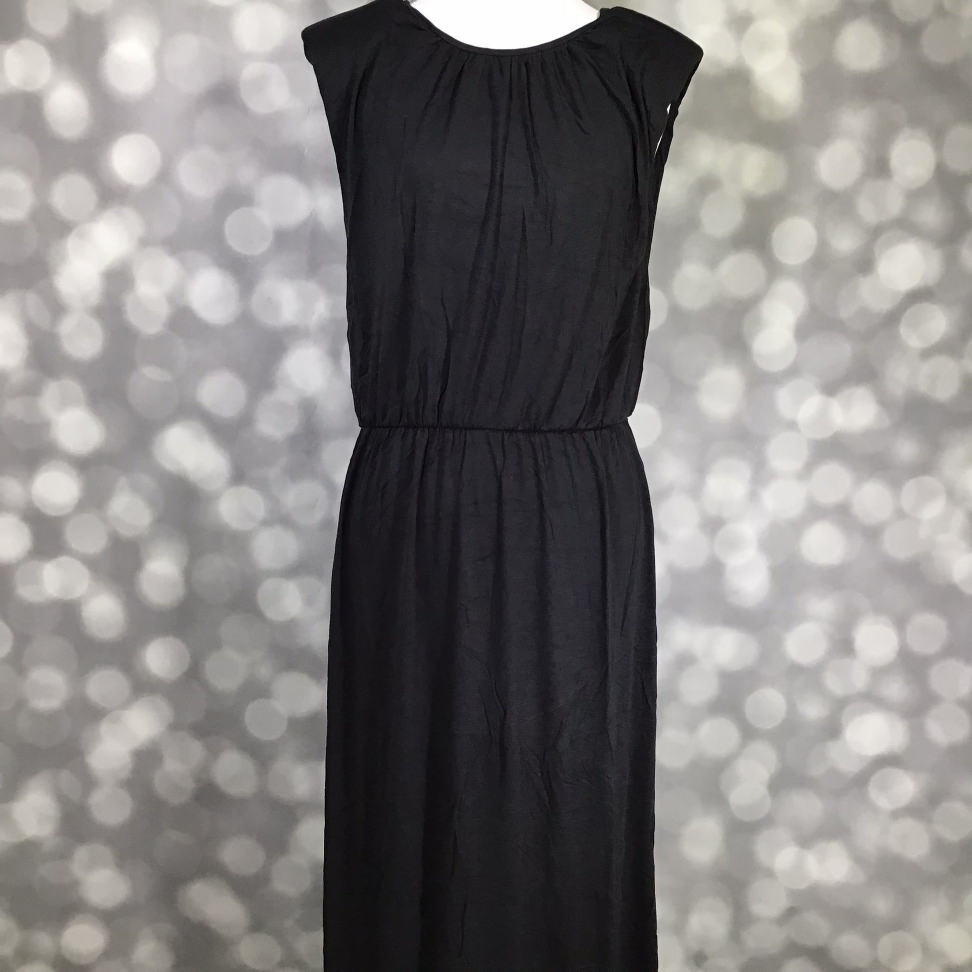 LuLaRoe Career Collection Serenity Dress in Solid Black with a modern muscle-tank silhouette and removable shoulder pads