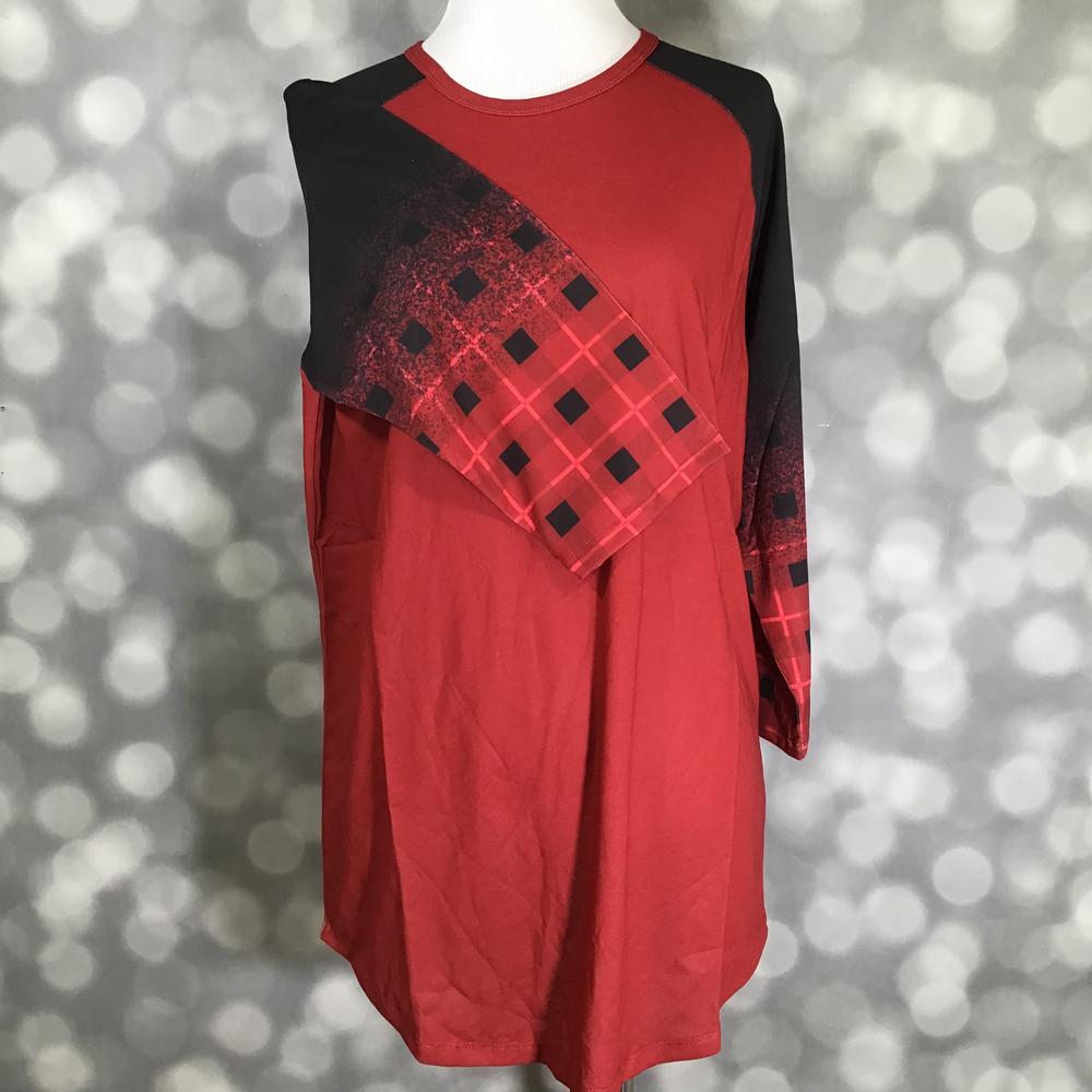LuLaRoe Randy Tee in Crimson Shadow Plaid featuring a rich crimson red body with black raglan sleeves printed in a distressed crimson and black buffalo plaid design in size Large.