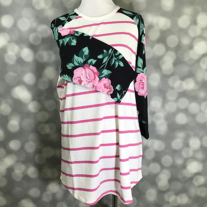LuLaRoe Randy Tee in Garden Party Stripe featuring an ivory body with raspberry pink stripes and black raglan sleeves printed with blush pink roses and sage green leaves in size Large.