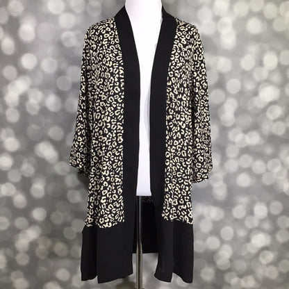LuLaRoe Aurora bell sleeve kimono in a black and ivory leopard print with solid black trim