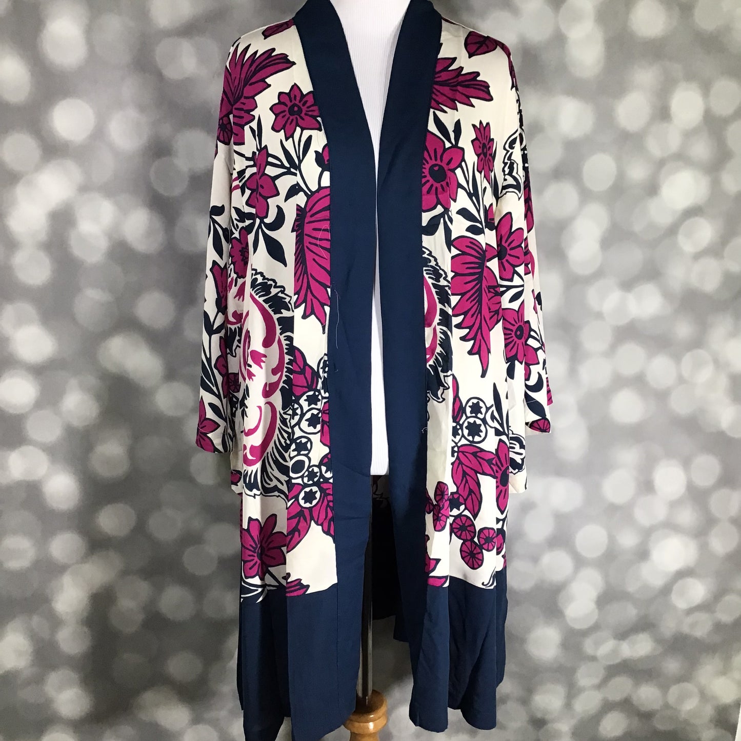 LuLaRoe Aurora bell sleeve kimono in a navy, ivory and magenta botanical floral print