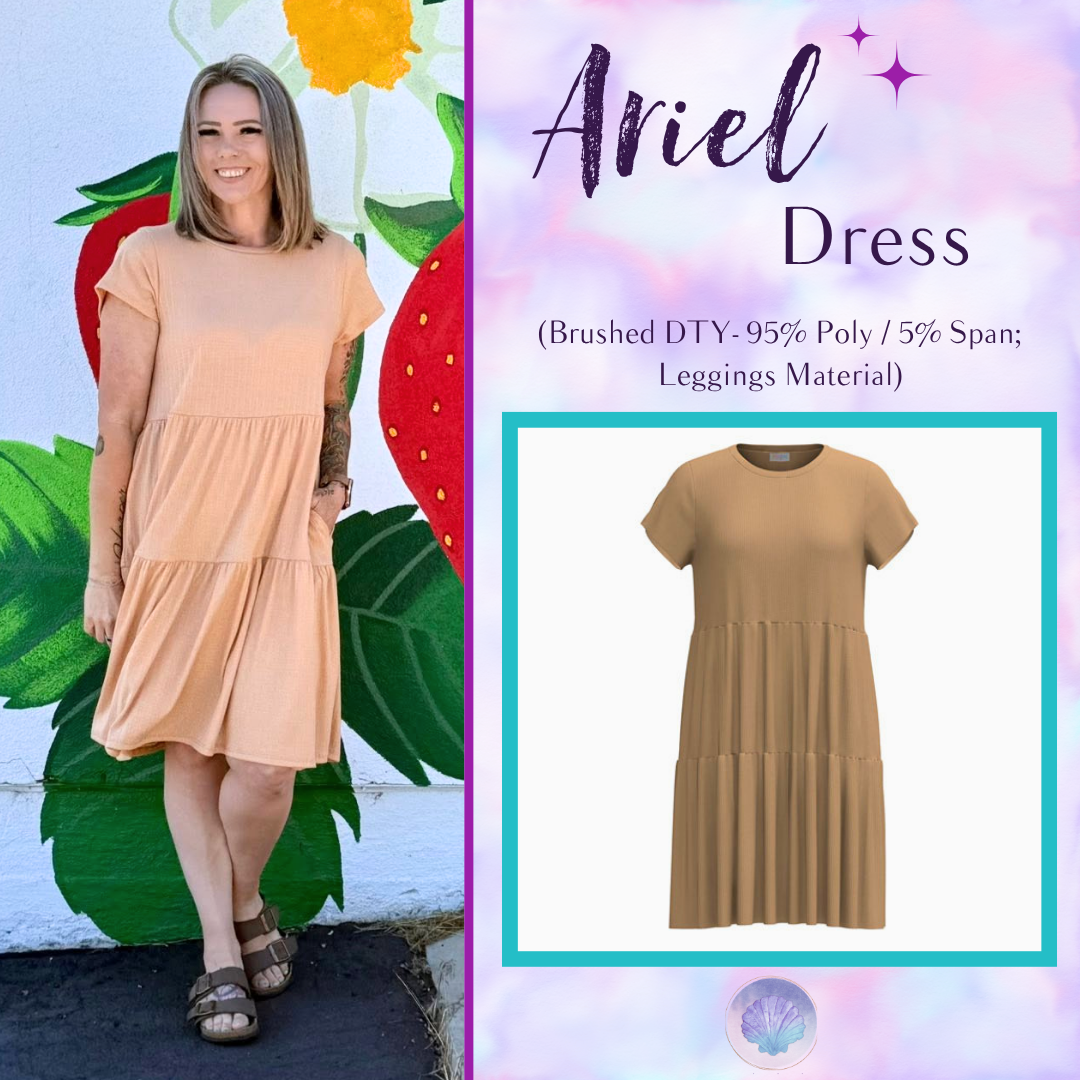 Woman wearing LuLaRoe Ariel Tiered Dress in Solid Warm Apricot, a soft peach beige tiered short dress with relaxed fit, flowy silhouette, and feminine casual styling for spring and summer.