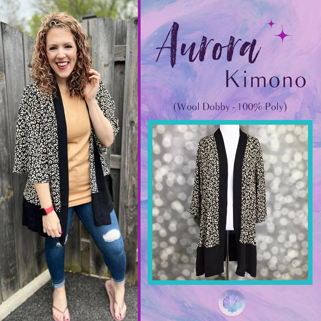 LuLaRoe Aurora bell sleeve kimono in a black and ivory leopard print with solid black trim