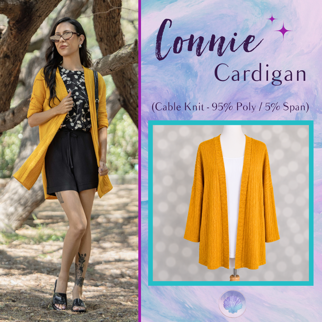 LuLaRoe Connie Lightweight Overlay in Solid Mustard featuring a lightweight cable knit texture, open front cardigan, relaxed fit, and long sleeves layered over a white ribbed tank.