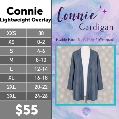 LuLaRoe Connie Lightweight Overlay in Solid Slate Blue featuring a lightweight cable knit texture, open front cardigan, relaxed fit, and long sleeves layered over a white ribbed tank.