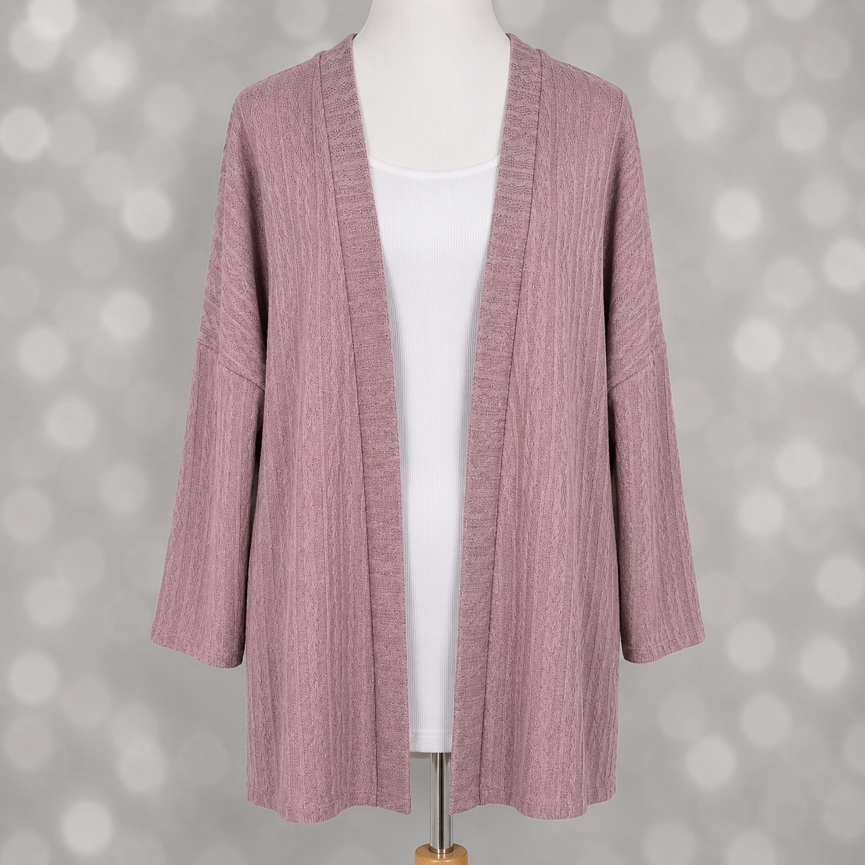 LuLaRoe Connie Lightweight Overlay in Solid Dusty Mauve featuring a lightweight cable knit texture, open front cardigan, relaxed fit, and long sleeves layered over a white ribbed tank.