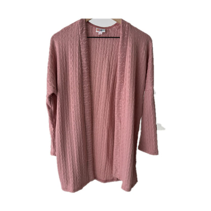 LuLaRoe Connie Lightweight Overlay in Solid Dusty Rose featuring a lightweight cable knit texture, open front cardigan, relaxed fit, and long sleeves layered over a white ribbed tank.