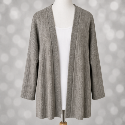 LuLaRoe Connie Lightweight Overlay in Solid Heather Gray featuring a lightweight cable knit texture, open front cardigan, relaxed fit, and long sleeves layered over a white ribbed tank.