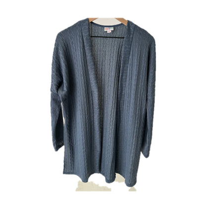 LuLaRoe Connie Lightweight Overlay in Solid Slate Blue featuring a lightweight cable knit texture, open front cardigan, relaxed fit, and long sleeves layered over a white ribbed tank.