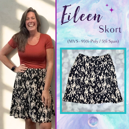 LuLaRoe Eileen Skort in Black and Ivory Abstract Print shown styled on a model and laid flat with a yoga waistband and flared silhouette