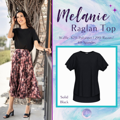 LuLaRoe Melanie Raglan Top in Solid Black with a relaxed fit, raglan sleeves, raw-edge seam details, rib knit texture, and a curved high-low hem.