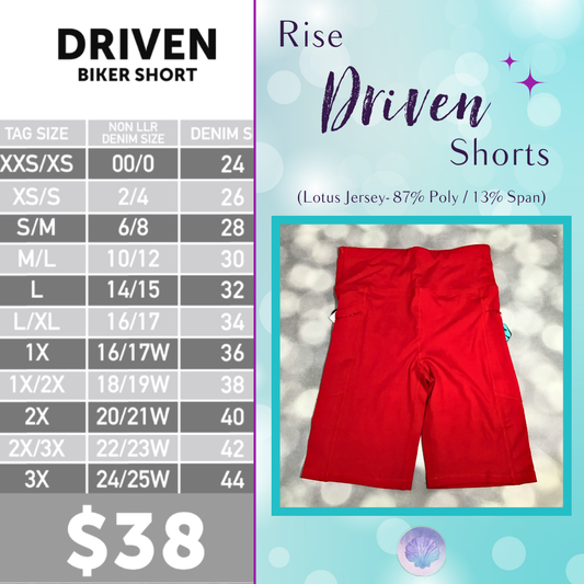 LuLaRoe Driven Shorts in solid crimson red, displayed flat on a soft gray bokeh background. The shorts feature a high-rise waistband, side pockets, and mid-thigh length in smooth Lotus Jersey fabric.