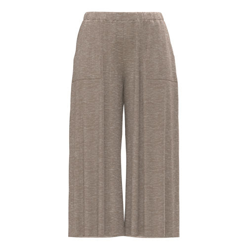 Cream textured pants on a white background