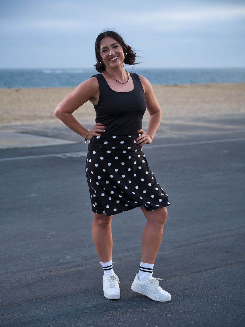 Model wearing the LuLaRoe Robyn Fitted Tank in solid black