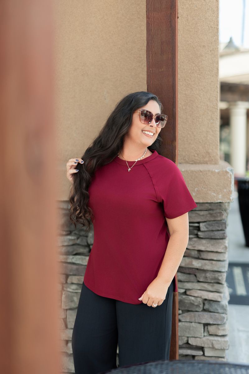 LuLaRoe Melanie Raglan Top in Solid Rich Burgundy product image.