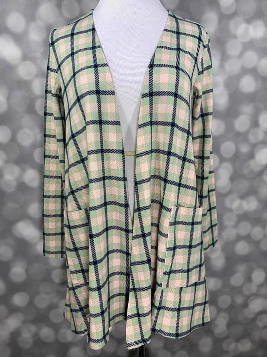 Front view of LuLaRoe Caroline cardigan displayed on mannequin featuring cream and mint plaid design with navy accents, open front, and patch pockets