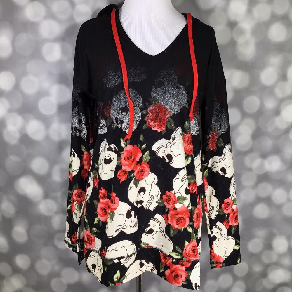 LuLaRoe Halloween Eliza Top with skull and red rose floral print, black background, hooded V-neck design, and relaxed fit on a mannequin against a blurred gray background
