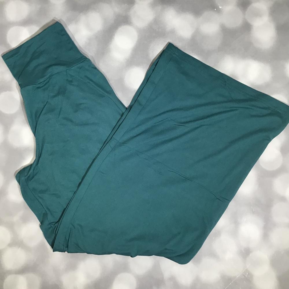 LuLaRoe Essential Wide Leg Pant in solid deep teal featuring relaxed wide-leg silhouette and comfortable waistband on a light gray background